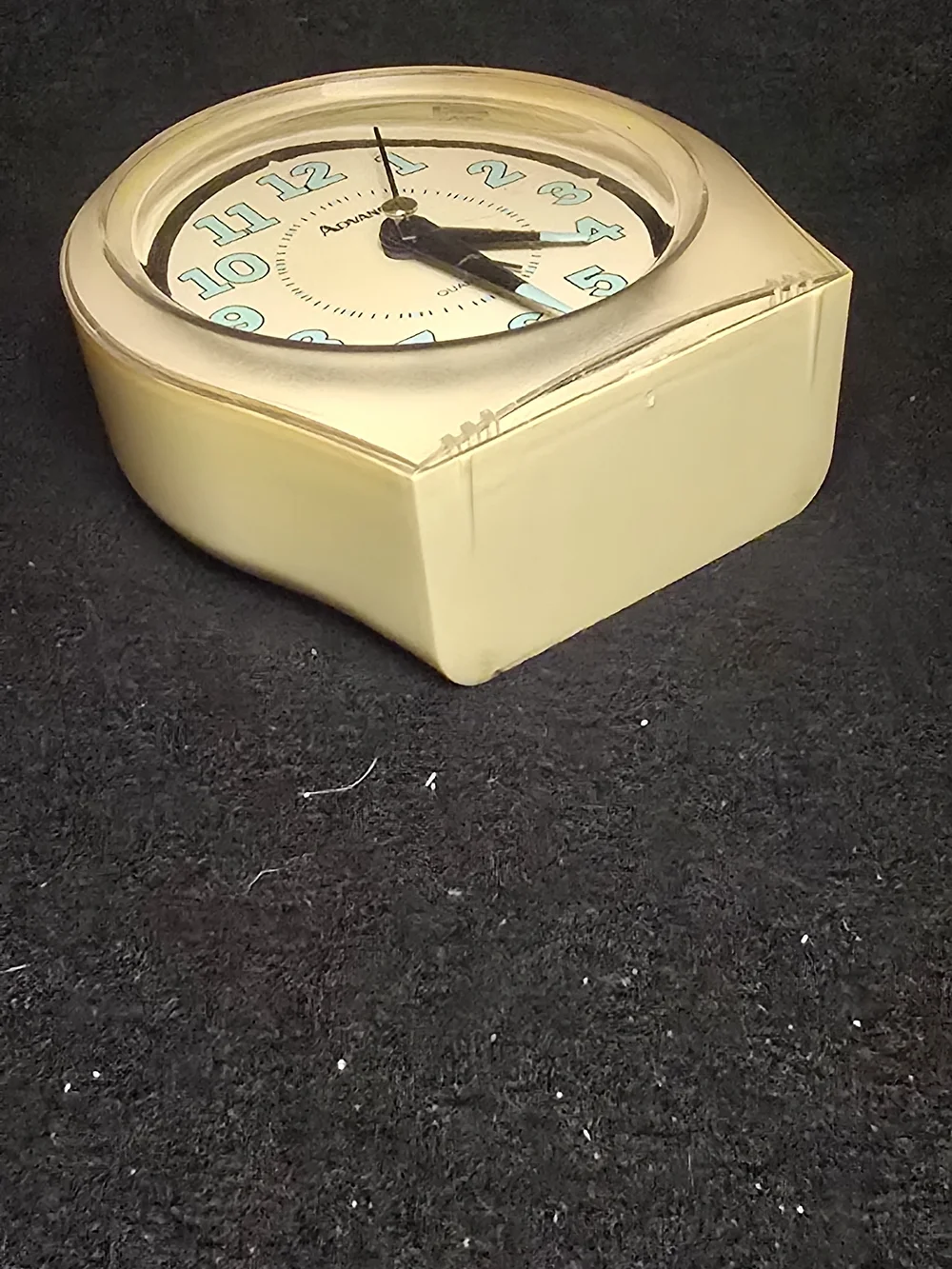 Advance Yellow Clock with Aqua Numerals